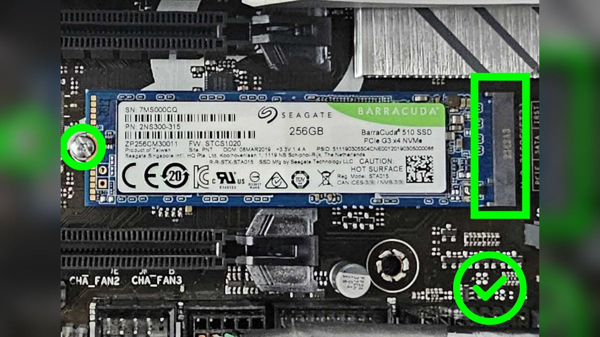 Seagate BarraCuda M.2 NVMe SSD installed on a motherboard, with the slot and mounting screw circled in green
