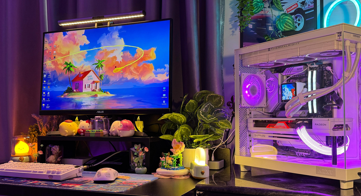 August setup contest winner desk with an ASUS monitor, plants, figurines, and a white glass PC case with purple RGB