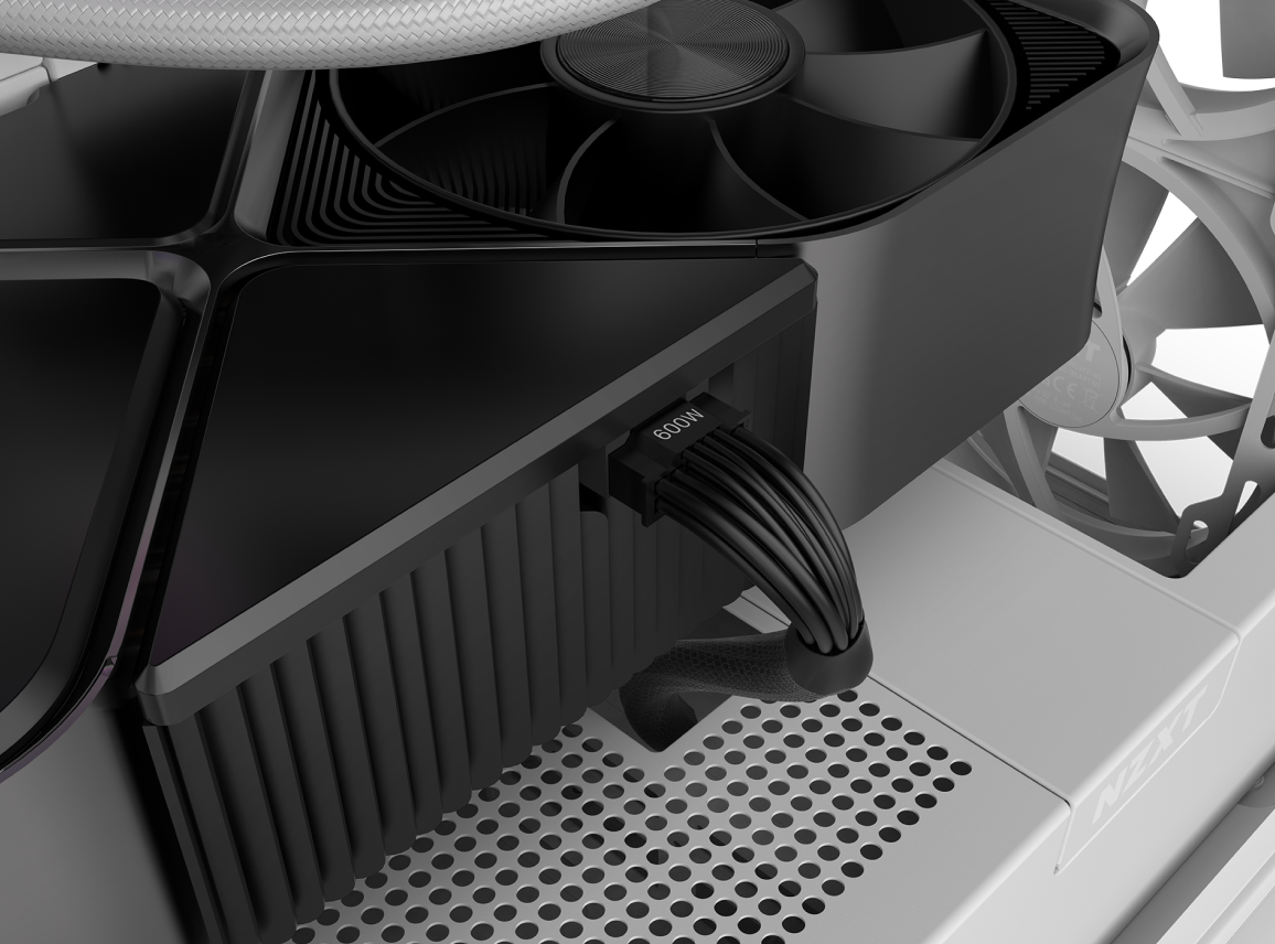 Close-up of a black graphics card installed in a computer case, showing the power connector with black cables plugged in, adjacent to large cooling fans and perforated metal panel marked NET.