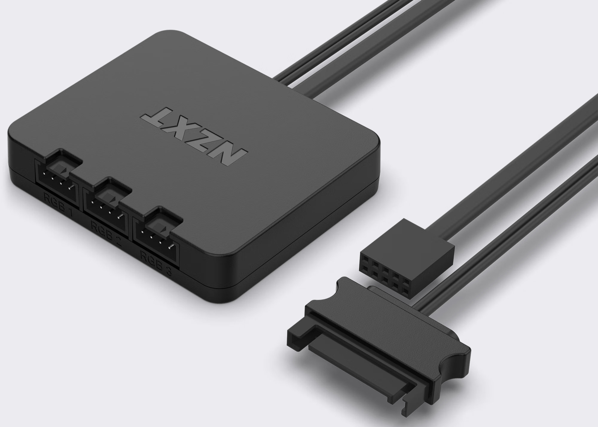 A black NZXT fan hub controller with three labeled ports and two attached flat cables, one ending in a 4-pin connector and the other in a SATA power connector, on a light background.