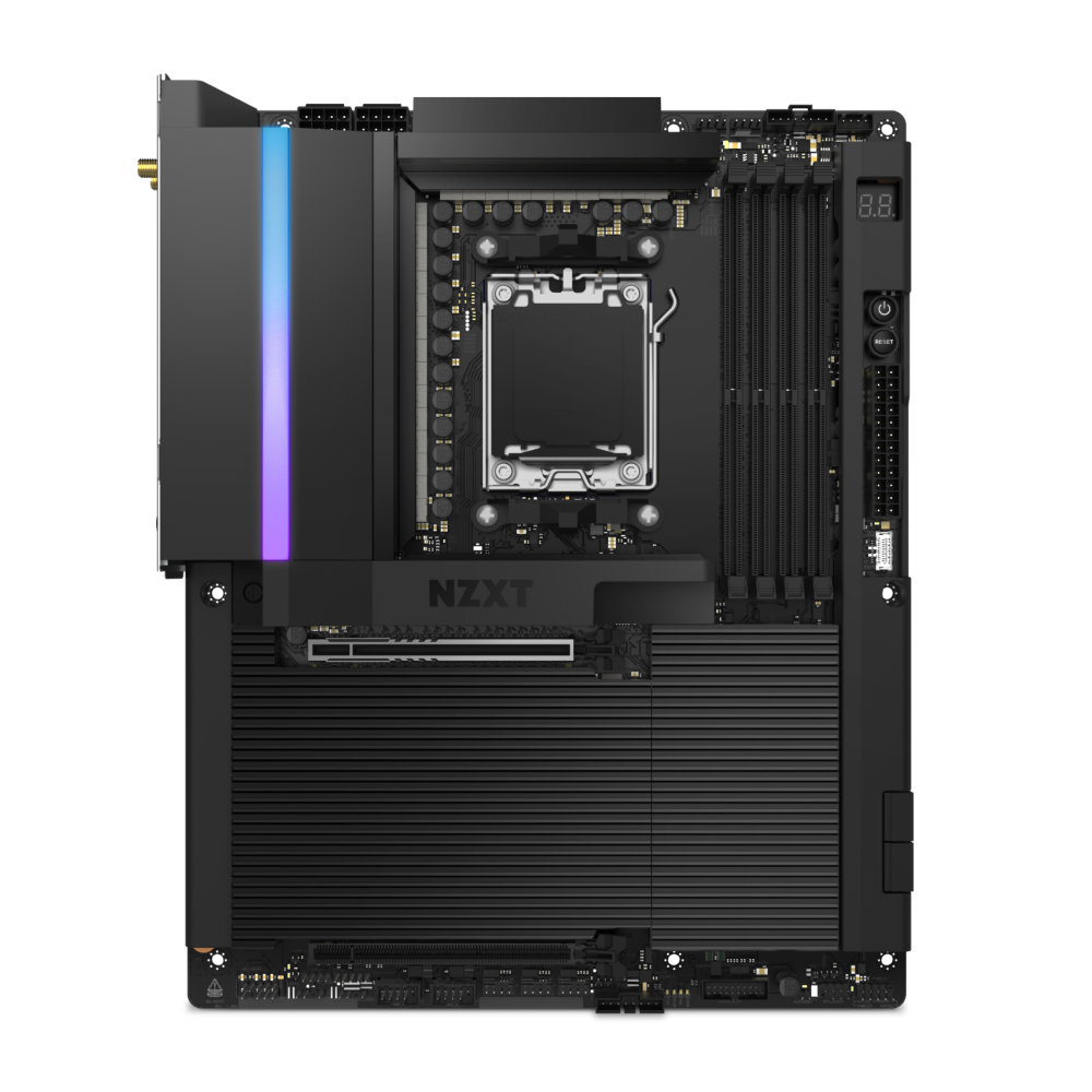 Top-down view of the NZXT N9 X870E ATX motherboard featuring black heatsinks, DDR5 support, multiple RAM and PCIe slots, RGB lighting on the left, and a centrally located CPU socket.