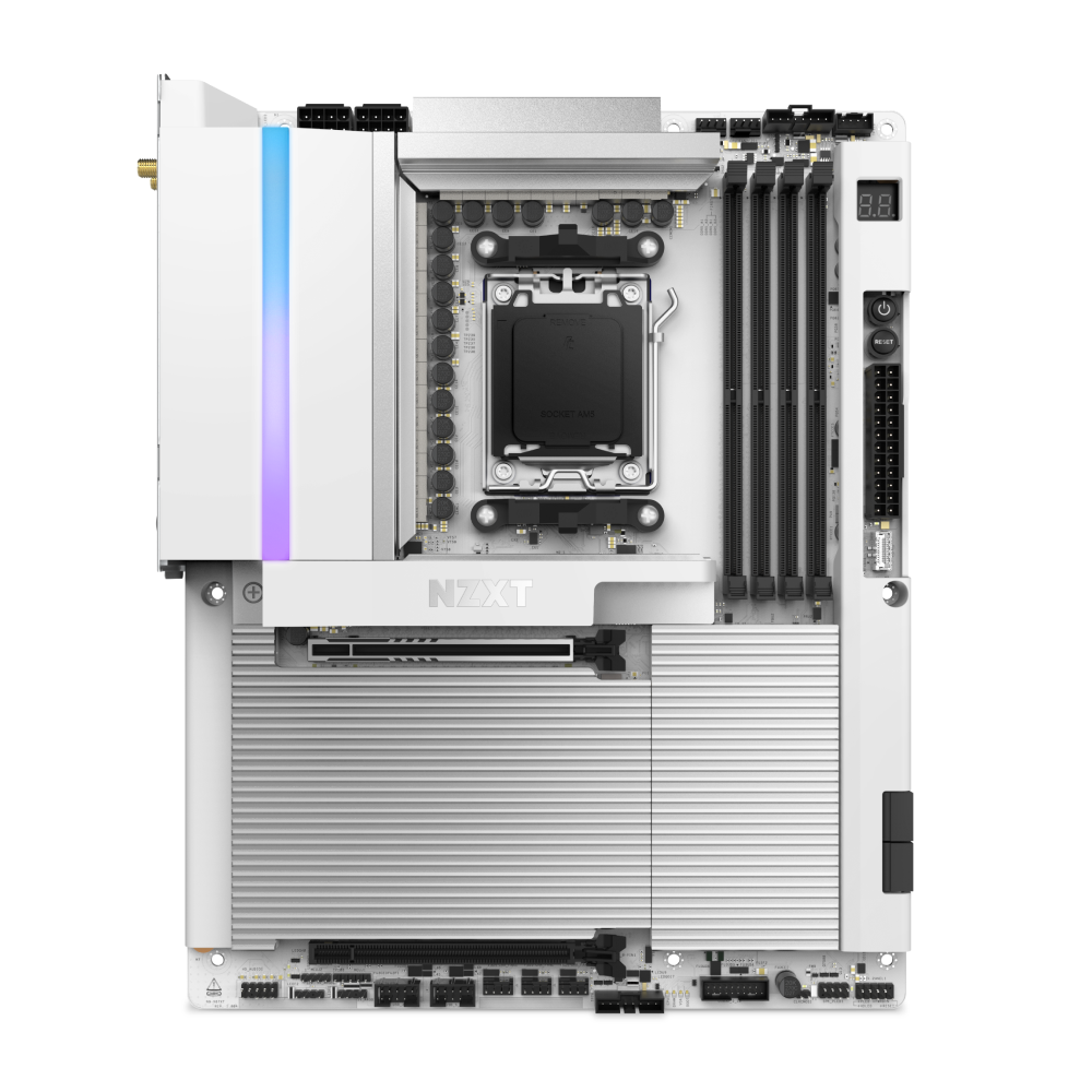 A top-down view of the NZXT N9 X870E motherboard in white, featuring AMD Ryzen support, DDR5 RAM slots, a CPU socket, heatsinks, PCIe 5.0 slots, and multiple connectors and ports.