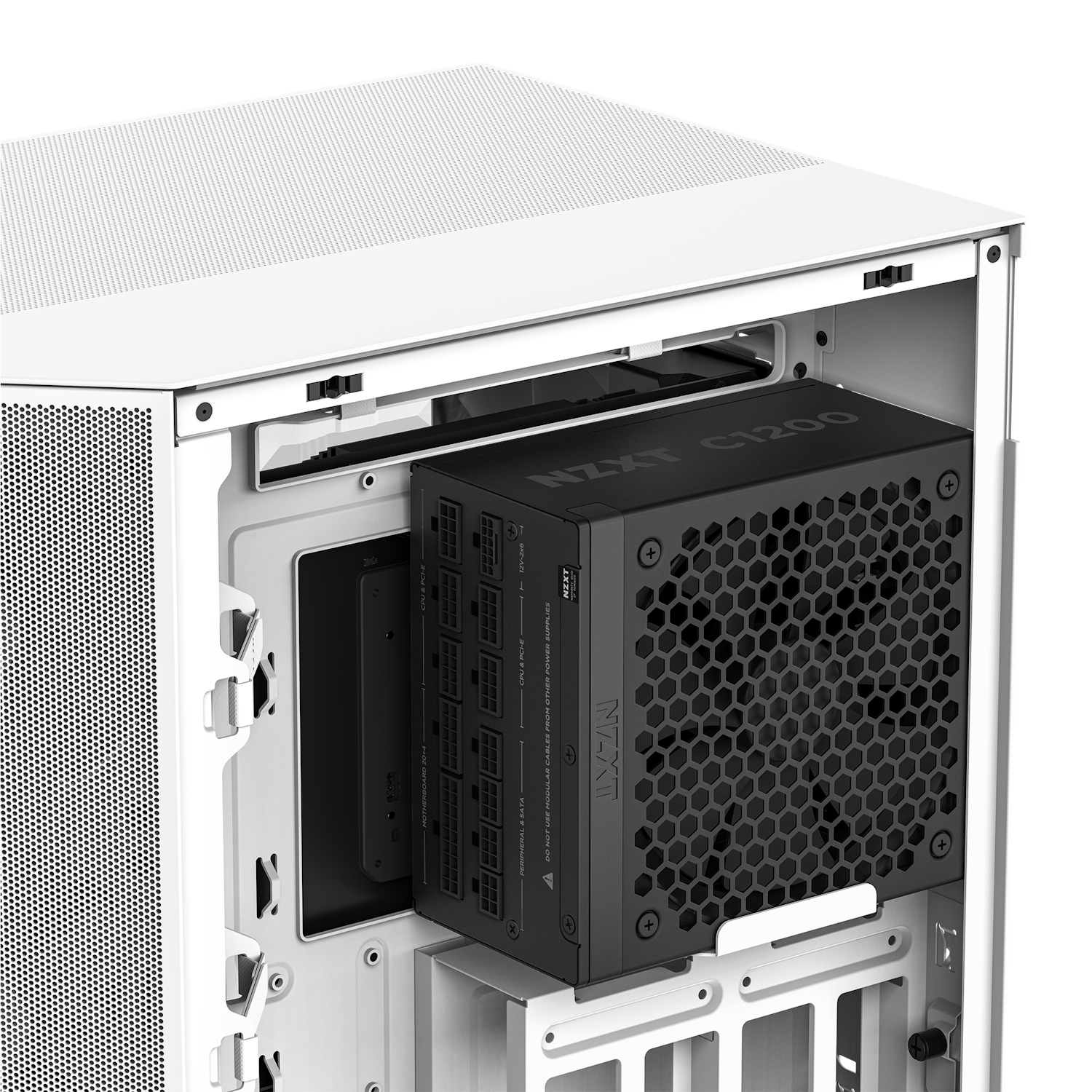 Close-up of the interior of a white computer case featuring an NZXT C1200 Gold ATX 3.1 PSU installed in the PSU bay, with mesh paneling and modular cable connectors visible.