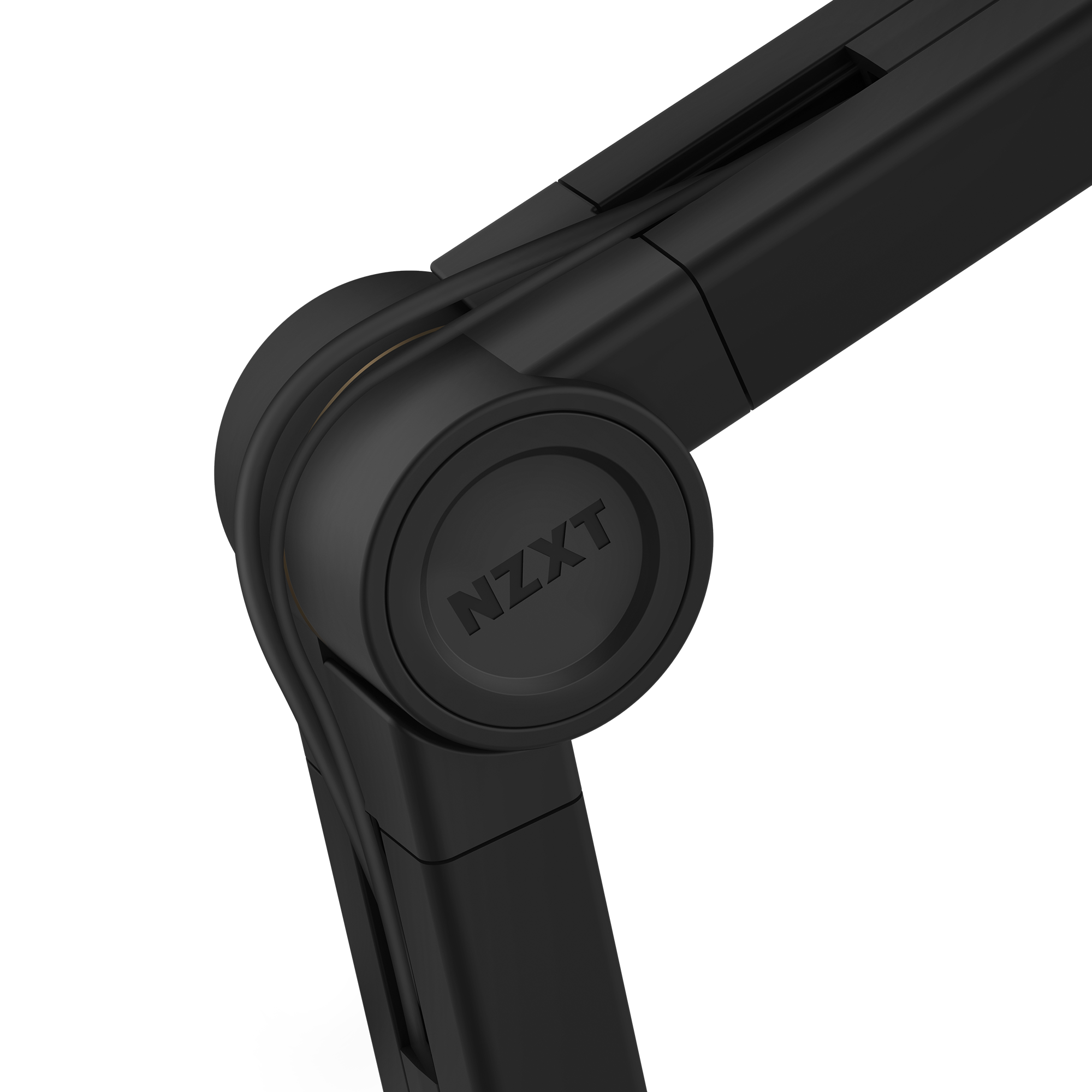 Close-up of the NZXT Boom Arm in black, showing smooth-moving arms, hidden cable management, and the NZXT logo embossed on its circular joint. The background features a mix of white and black.