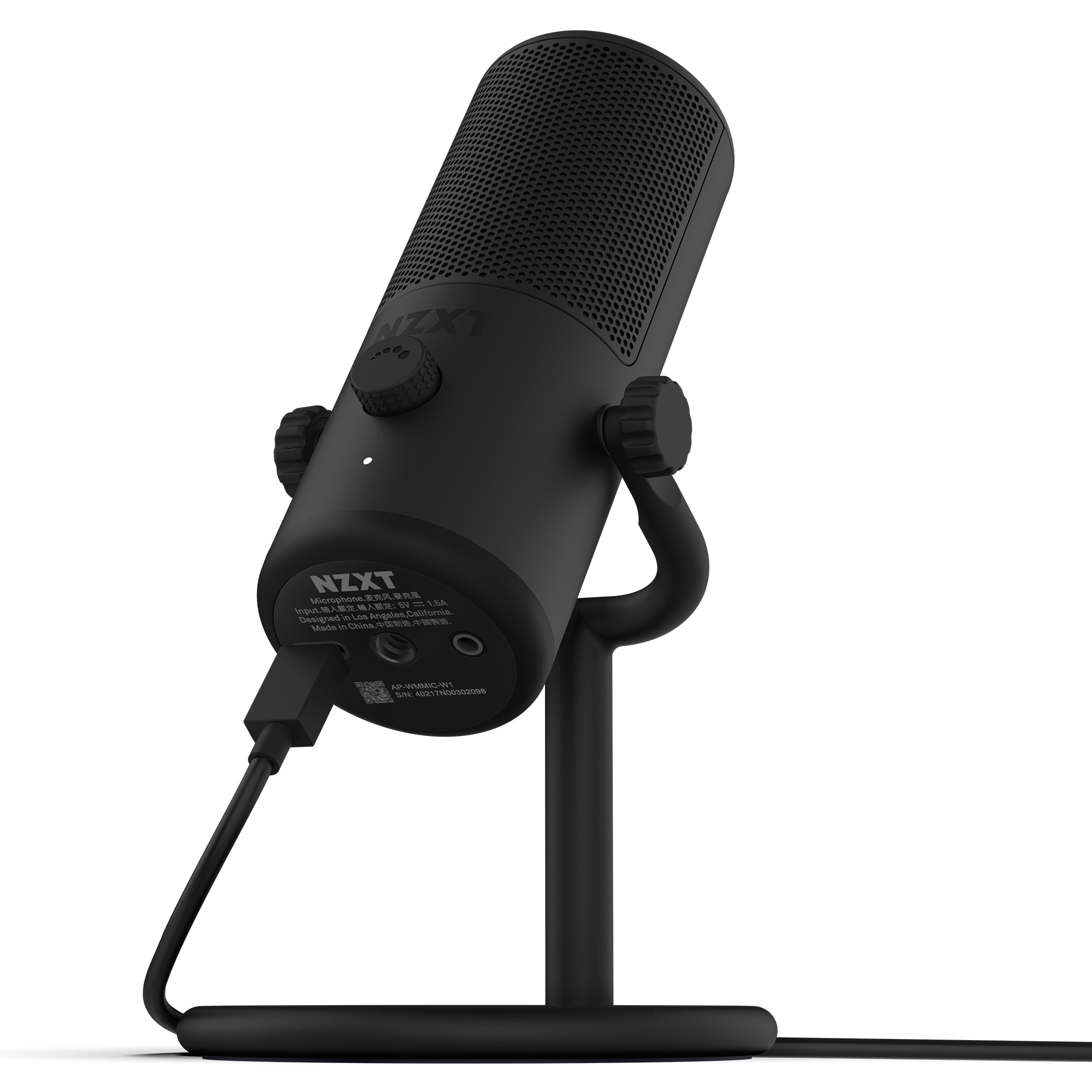 A black NZXT Capsule Mini USB microphone sits on a stand, angled upward with a connected USB cable and adjustment knobs—ideal for content creation or gaming streams.